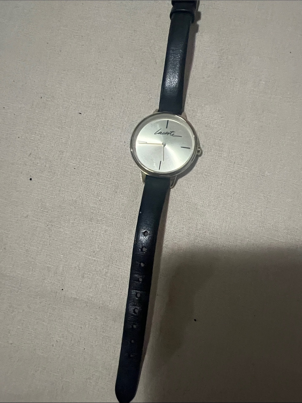 Women’s Lacoste Silver Dial Watch with Black Leather Strap